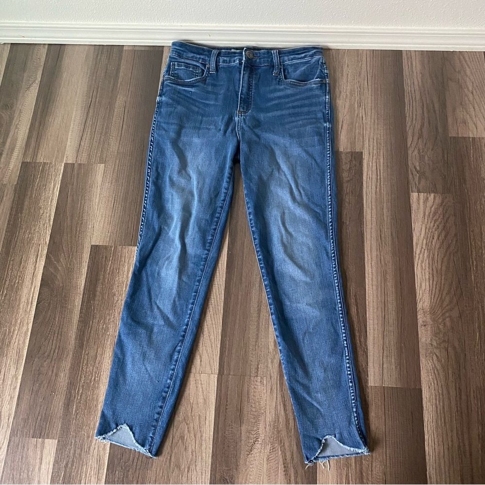 Blue Skinny Jeans with Distressed Hem